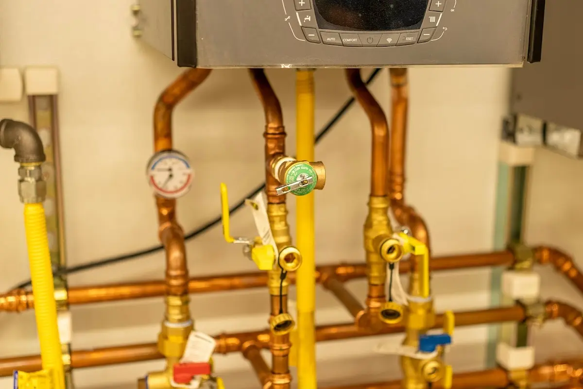 Licensed technician providing Slab Leak Repair for a homeowner in Grand Forks